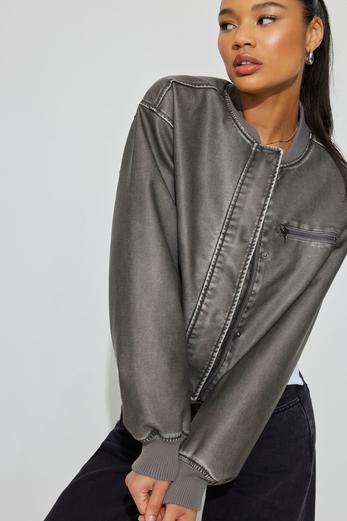 ASOS DESIGN washed faux leather bomber jacket in black