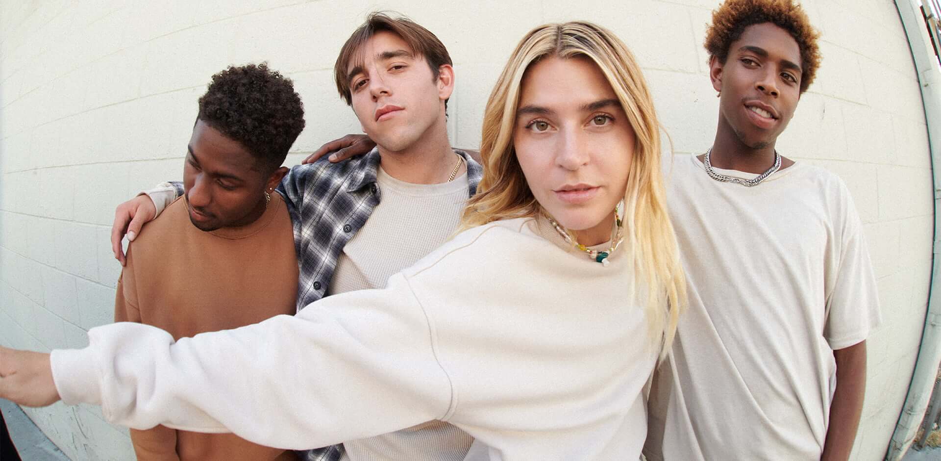 Alex, TyTy, and Aramis pose in the new unisex drop.