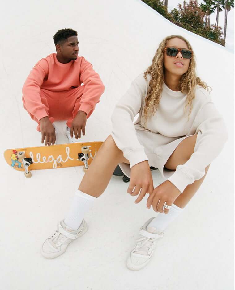 Olan and Aramis are posing on their skateboards in the new unisex drop.