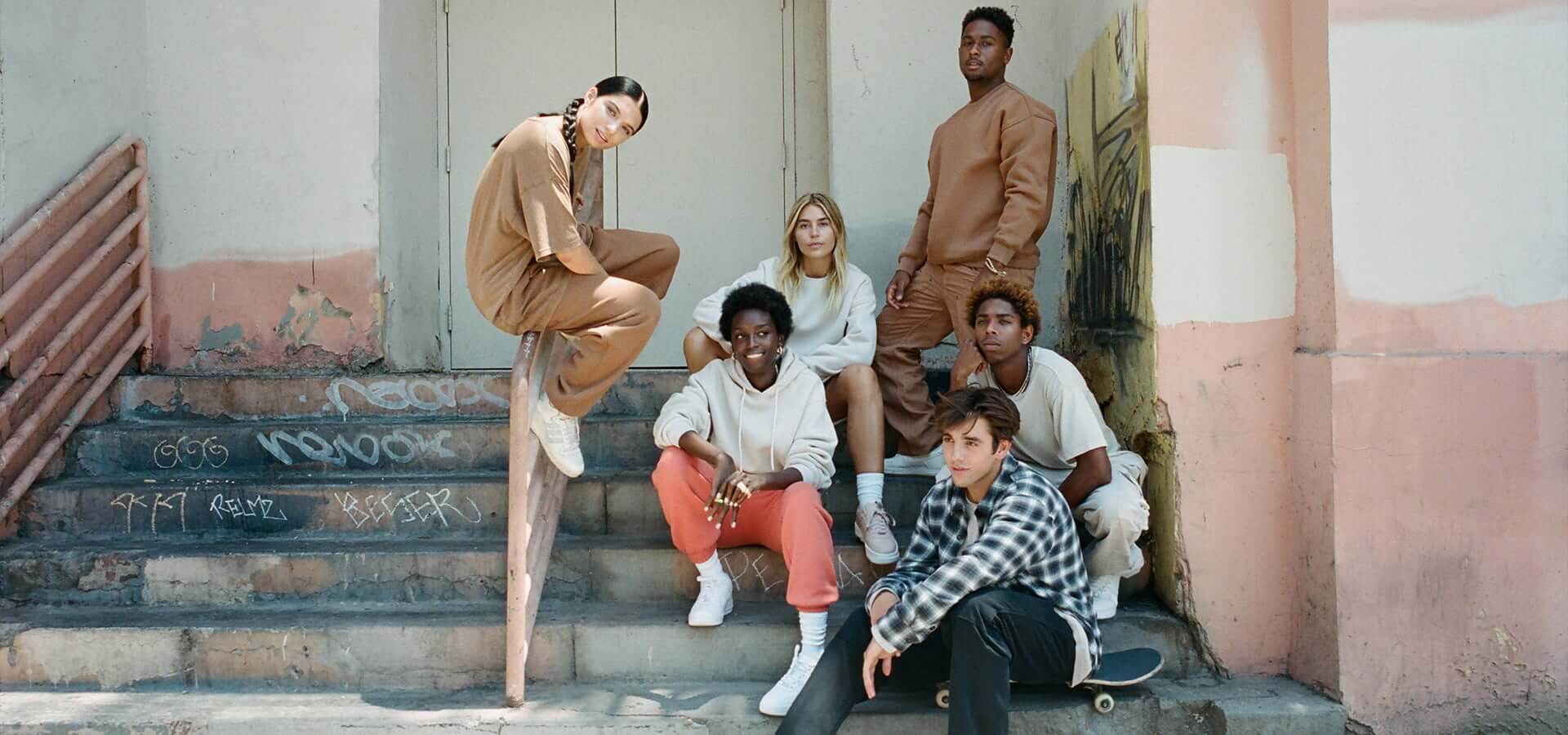 The whole cast of the Garage For All campaign pose in the new unisex and fall collections.