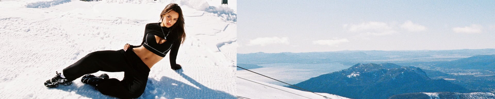 Two models pose with their skis. One wears a black puffer vest with a grey sweater, bra top, and sweats. The other wears ski goggles, a black puffer coat and black sweats.