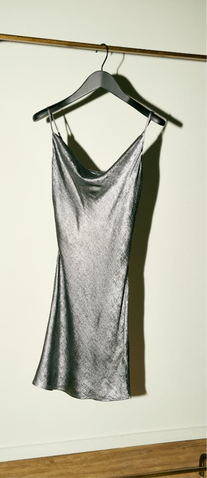 Metallic silver dani mini dress on hanger.